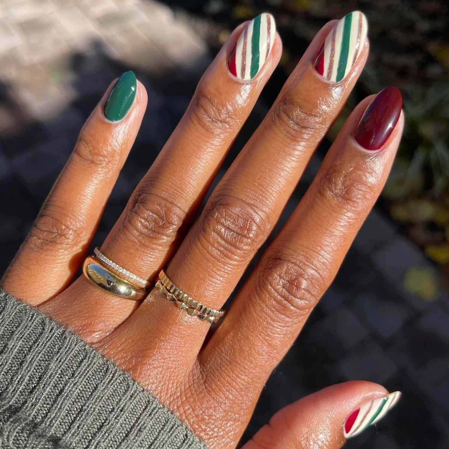 Burgundy and Green Striped Ovals Burgundy and Green Striped Ovals — Burgundy Christmas Nails 2026