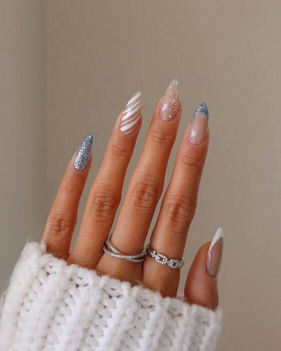Silver Glitter Snowflake White Blue French Almonds Silver Glitter Snowflake White Blue French Almonds — Christmas Almond Nails 2026