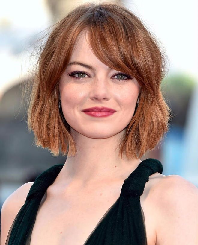 Vibrant Red Chin Bob With Side Bangs — Winter Haircuts for Square Faces