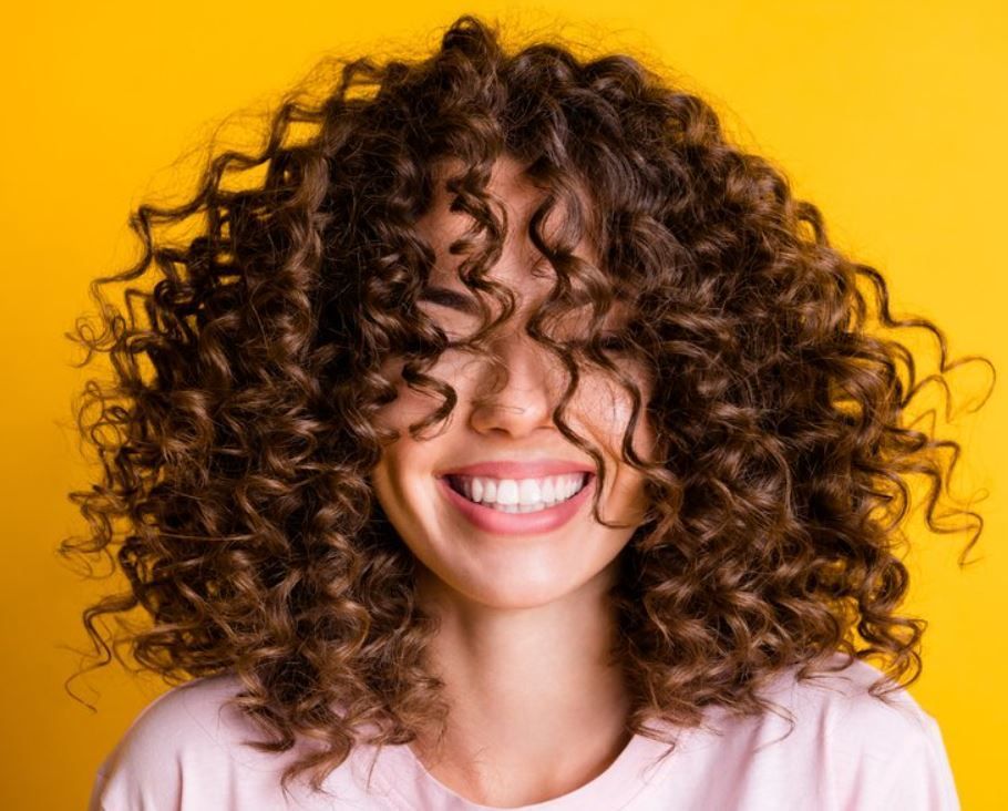 Medium Brown Curly Lob Medium Brown Curly Lob — Winter Hairstyles for Curly Hair