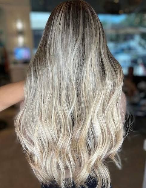 Blonde Balayage Wavy Blowout Blonde Balayage Wavy Blowout — Winter Hairstyles for Long Hair