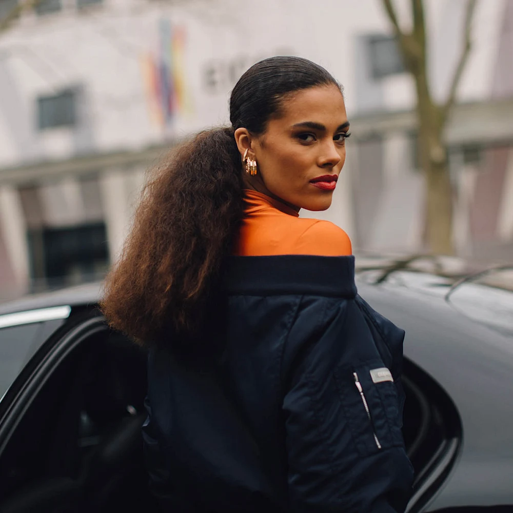 High Voluminous Curly Ponytail High Voluminous Curly Ponytail — Winter Haircuts for Curly Hair