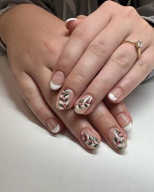 Medium Almond Nude French with Leaf Motif Medium Almond Nude French with Leaf Motif — Subtle Christmas Nails 2026