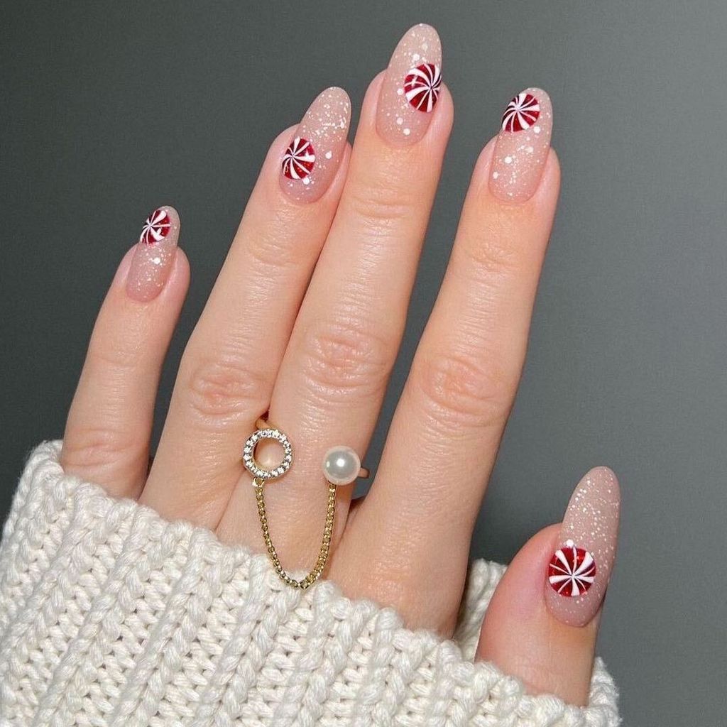 Glitter Nude with Candy Cane Stripes Glitter Nude with Candy Cane Stripes — Christmas Nail Art 2026
