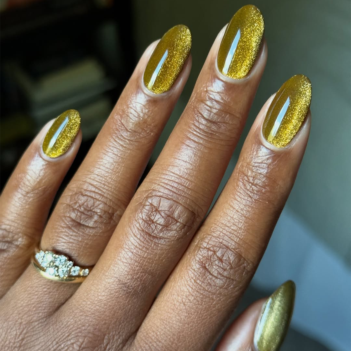 Golden Yellow Cat-Eye Almond Nails Golden Yellow Cat-Eye Almond Nails — Holiday Party Nails 2026