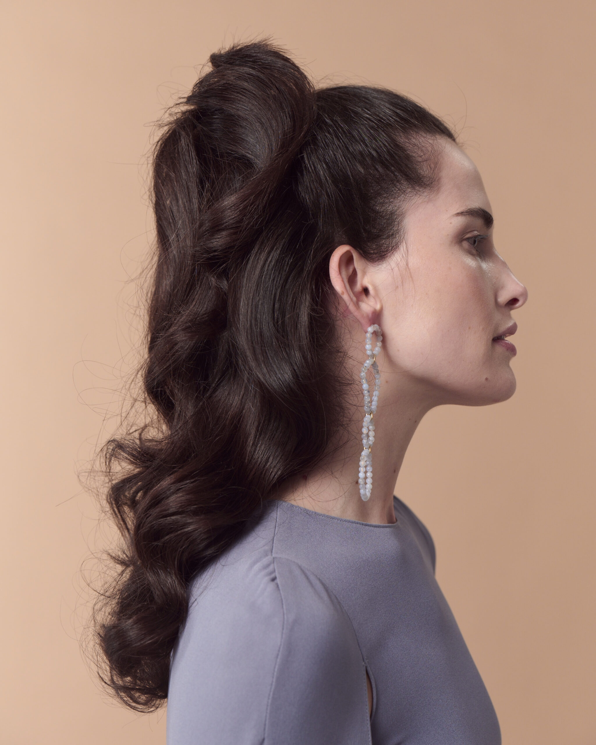 Mid-Back Voluminous Dark Brown Ponytail Mid-Back Voluminous Dark Brown Ponytail — Winter Party Hairstyles