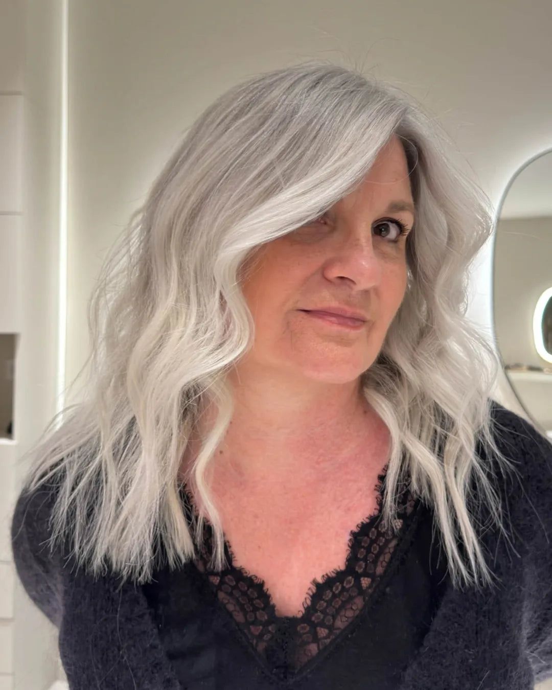 Mid-Back Layers With Ash Blonde and Silver Blend Mid-Back Layers With Ash Blonde and Silver Blend — Gray Blending Highlights