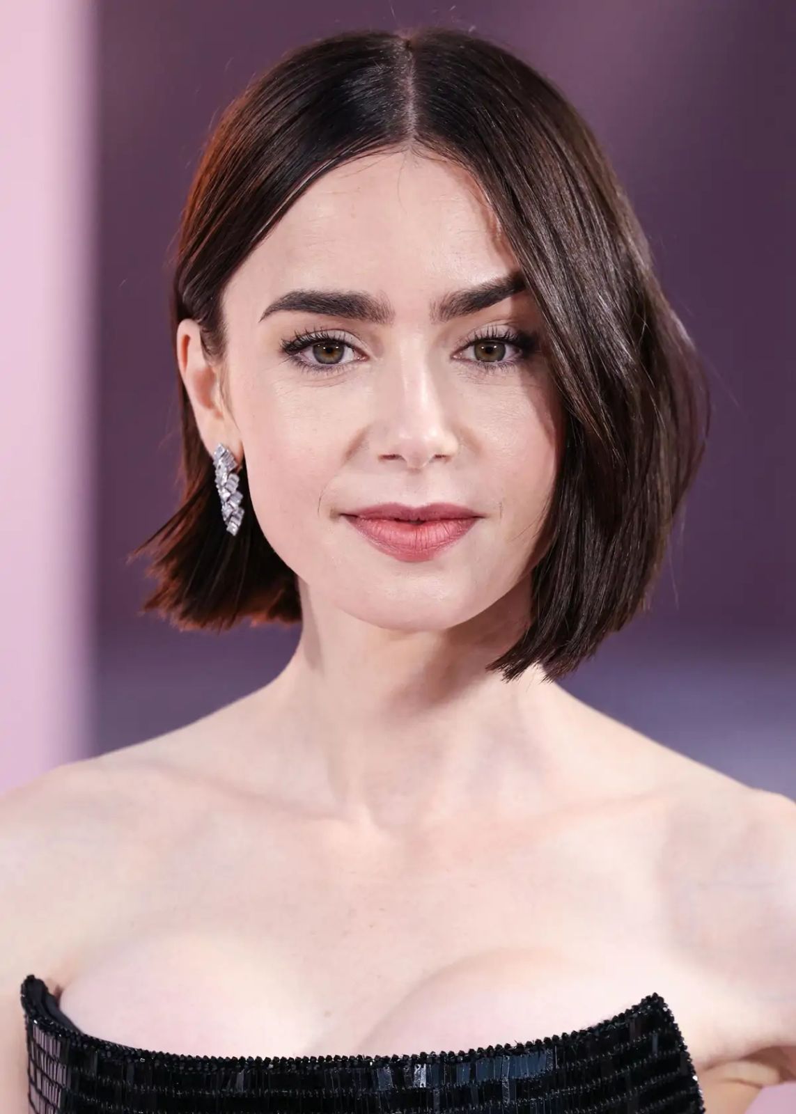 Sleek Chin Length Dark Brown Bob — Winter Haircuts for Oval Faces
