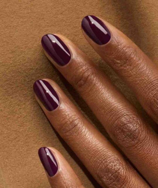 Deep Plum with Red Undertones Glossy Ovals Deep Plum with Red Undertones Glossy Ovals — Winter Nail Colors for Dark Skin