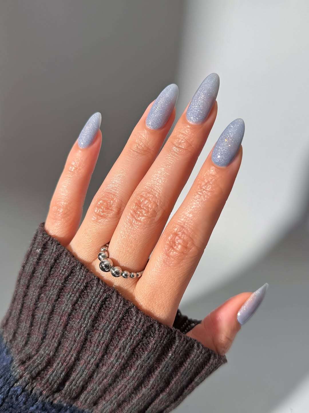 Cool Blue Shimmer Almond Nails Cool Blue Shimmer Almond Nails — Holiday Party Nails 2026