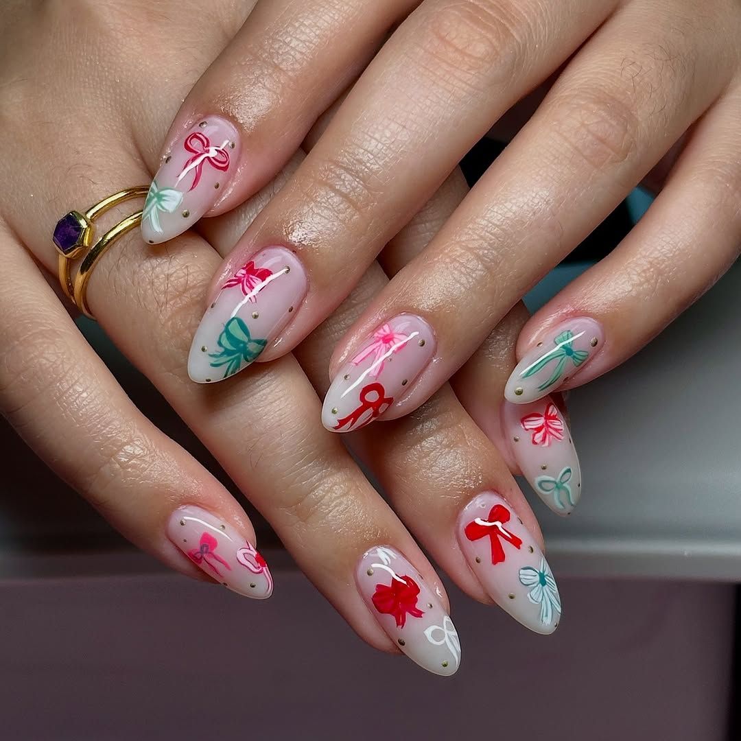 Sheer Pink Bow Almond Nails Sheer Pink Bow Almond Nails — Short Christmas Almond Nails 2026