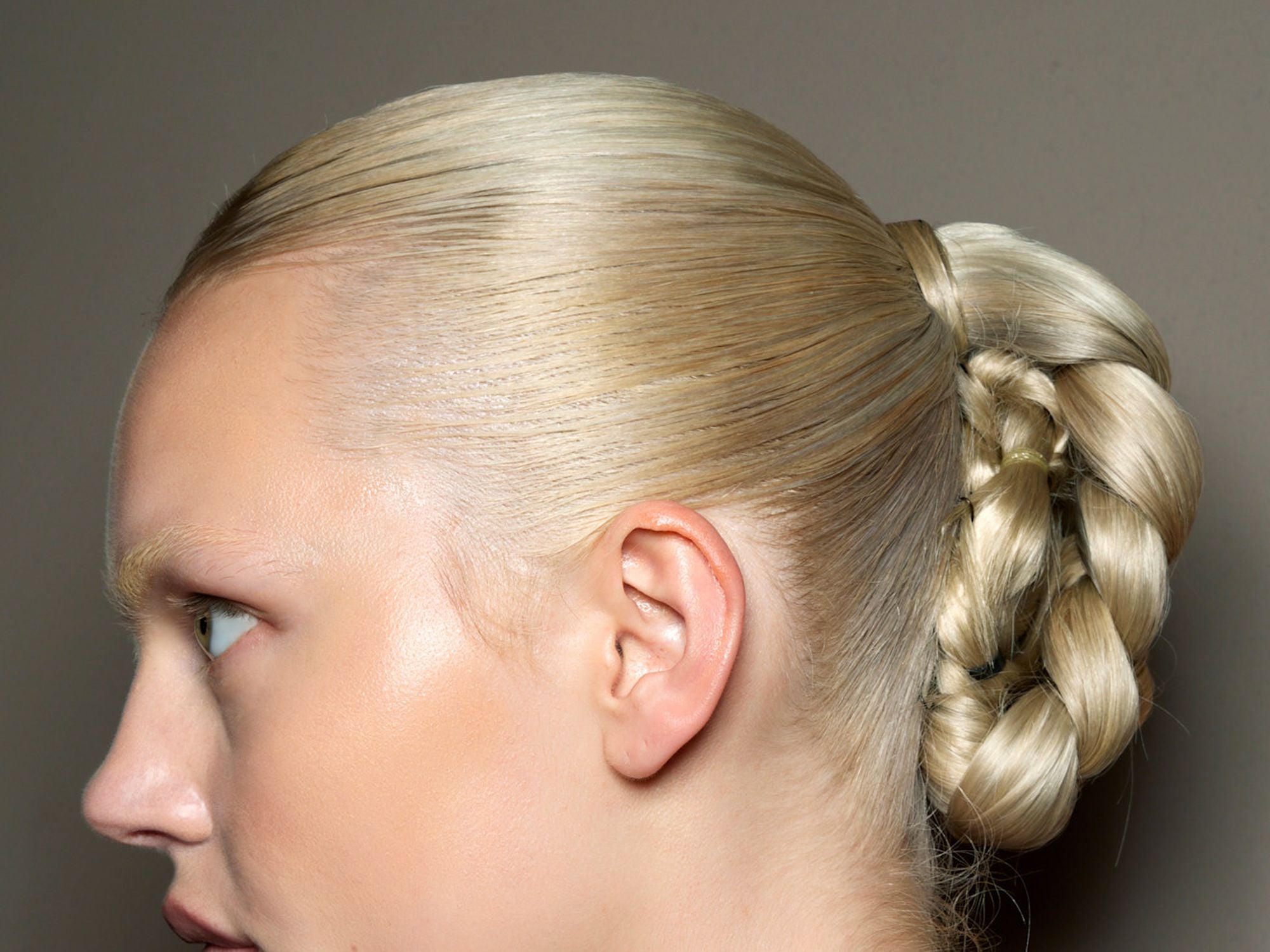 Slicked Ash Blonde Braided Bun Slicked Ash Blonde Braided Bun — Winter Party Hairstyles