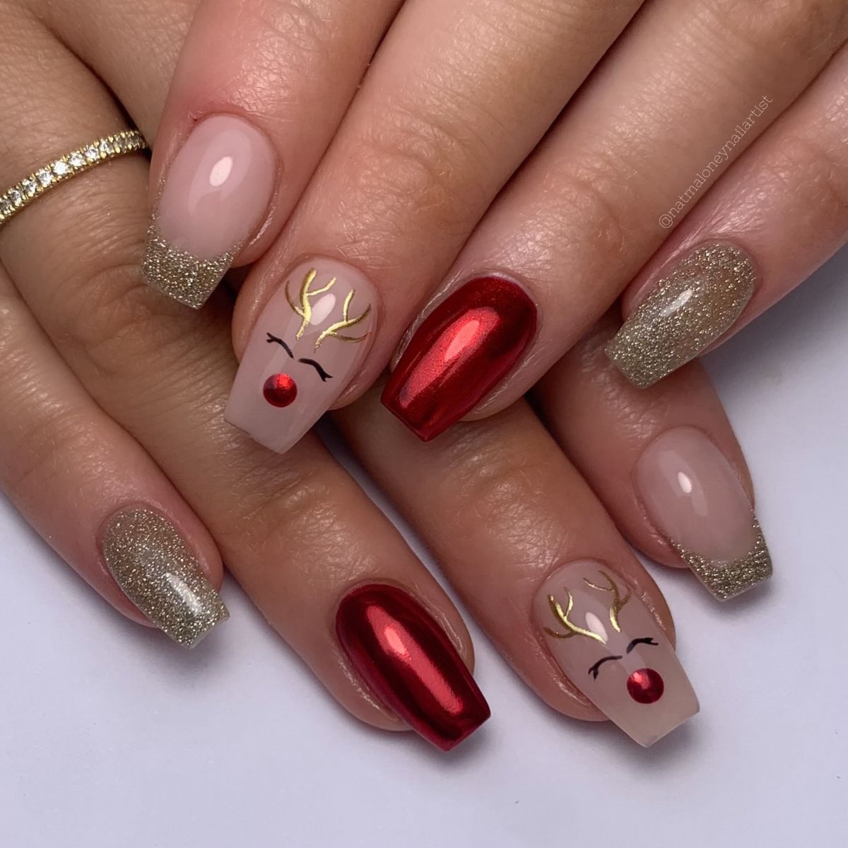 Delicate Red Glitter Accents with a Nude Base Delicate Red Glitter Accents with a Nude Base — Red and Gold Christmas Nails 2026