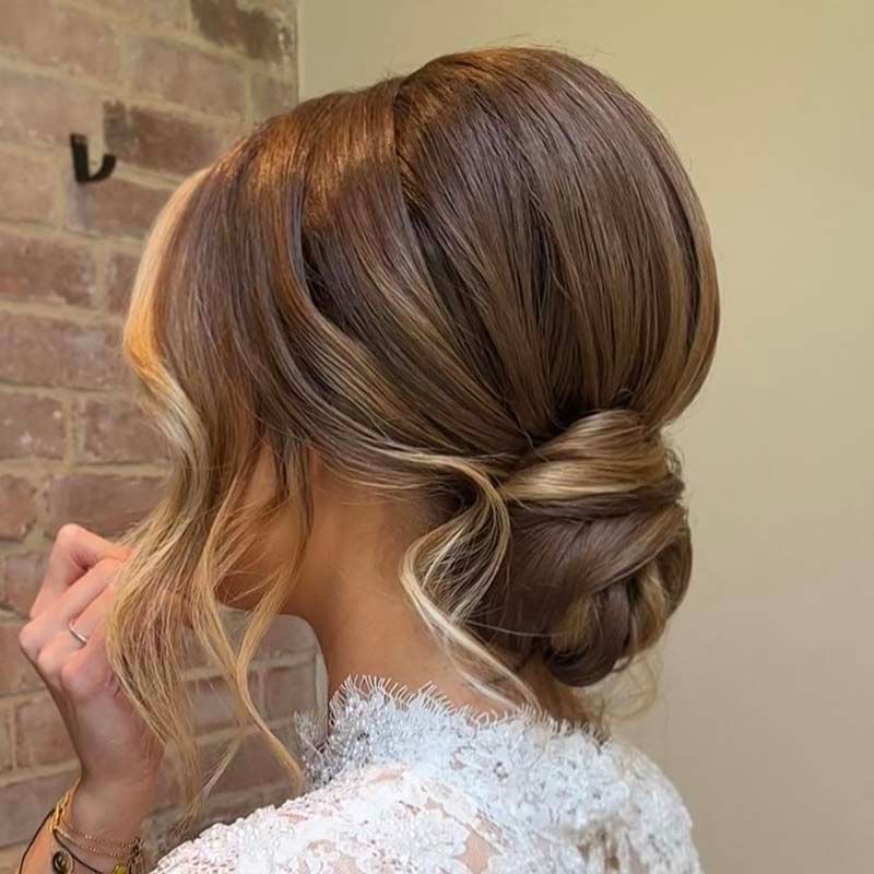 Honey Blonde Low Bun With Tendrils Honey Blonde Low Bun With Tendrils — Winter Formal Hairstyles