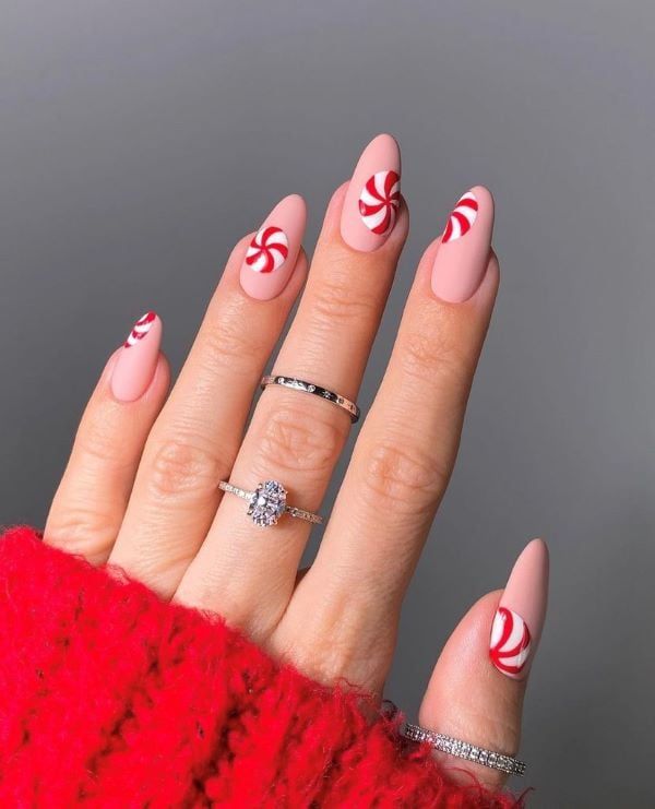 Candy Cane Stripes On Accent Nails Visual Idea Candy Cane Stripes On Accent Nails Visual Idea — Short Christmas Almond Nails 2026