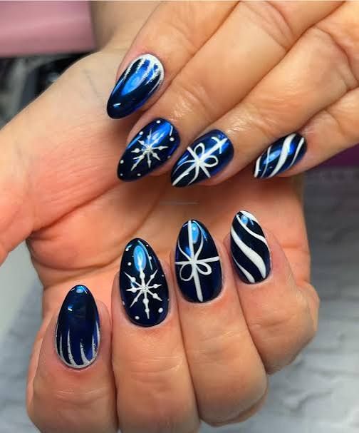 Glossy Chrome-Like Visual Idea Glossy Chrome-Like Visual Idea — Christmas Almond Nails 2026