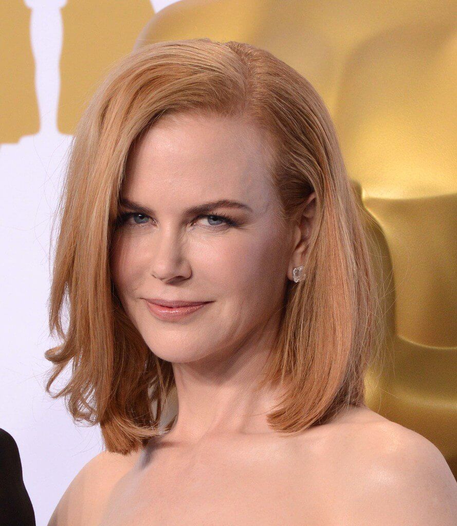Strawberry Blonde Bob With Side Bangs — Winter Haircuts for Square Faces