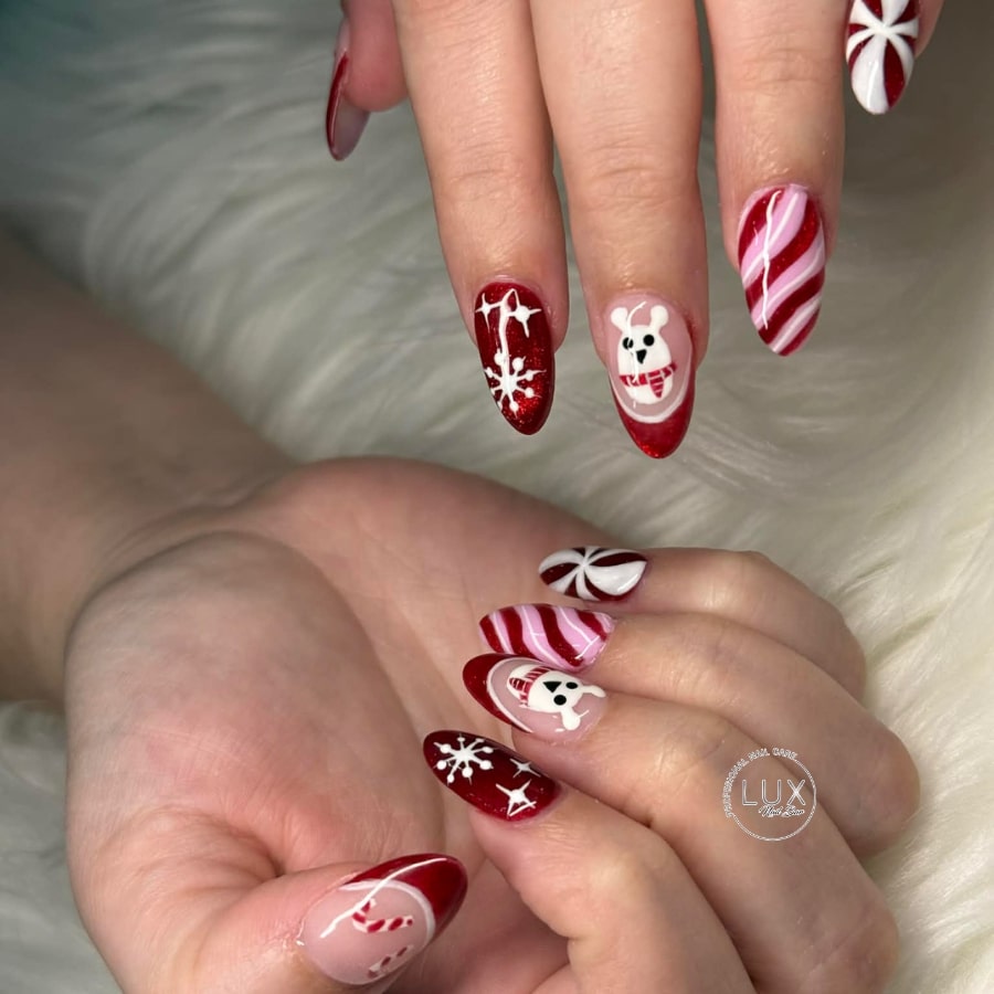 Medium Almond Detailed Christmas Nails Medium Almond Detailed Christmas Nails — Christmas Acrylic Nails 2026