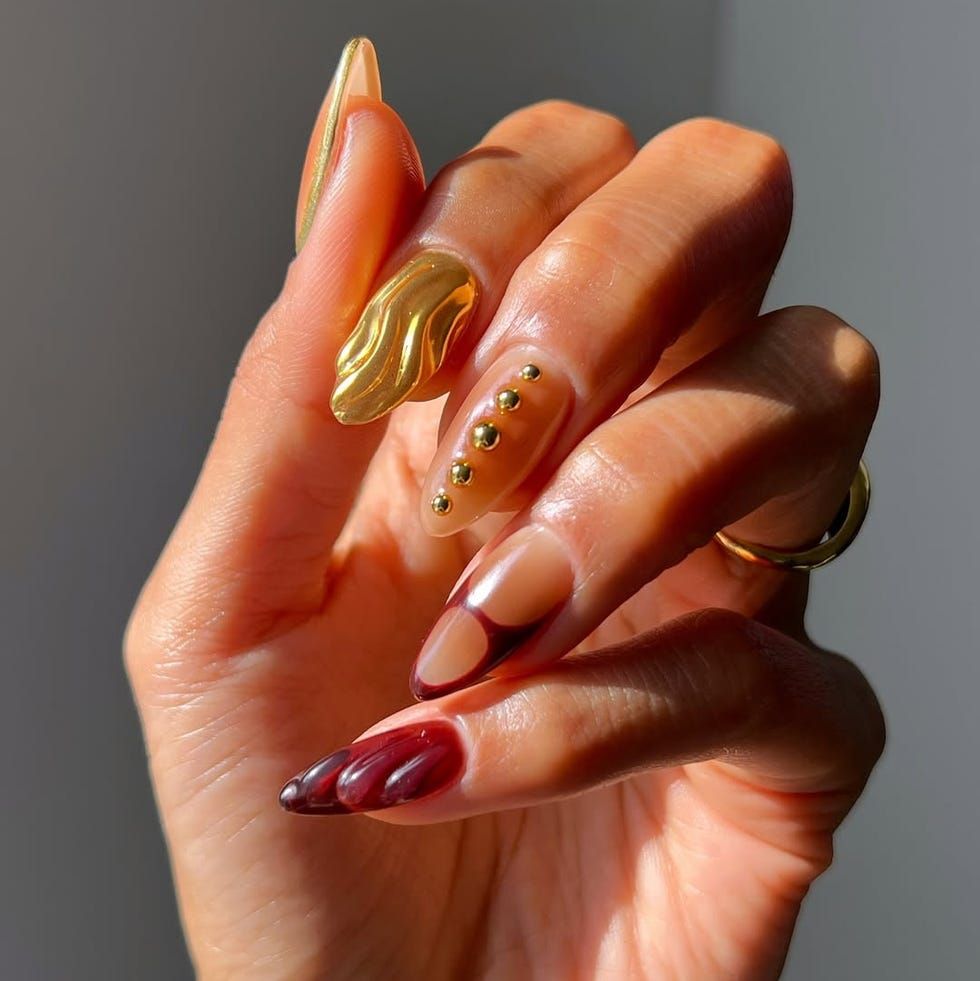 Medium Almond Abstract Dark Red Gold Studs Medium Almond Abstract Dark Red Gold Studs — Winter Gold Nails