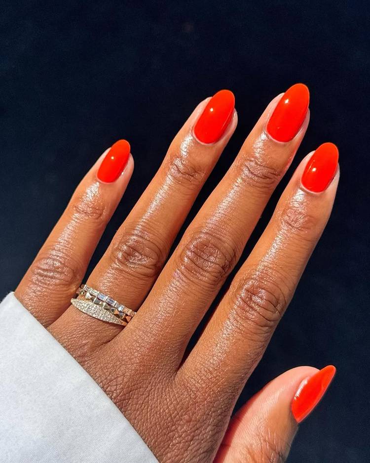 Neon Orange Glossy Oval Nails Neon Orange Glossy Oval Nails — Holiday Party Nails 2026