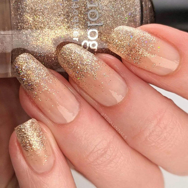 Medium Oval Nude Gold Glitter Gradient Nails Medium Oval Nude Gold Glitter Gradient Nails — New Years Eve Nails 2027