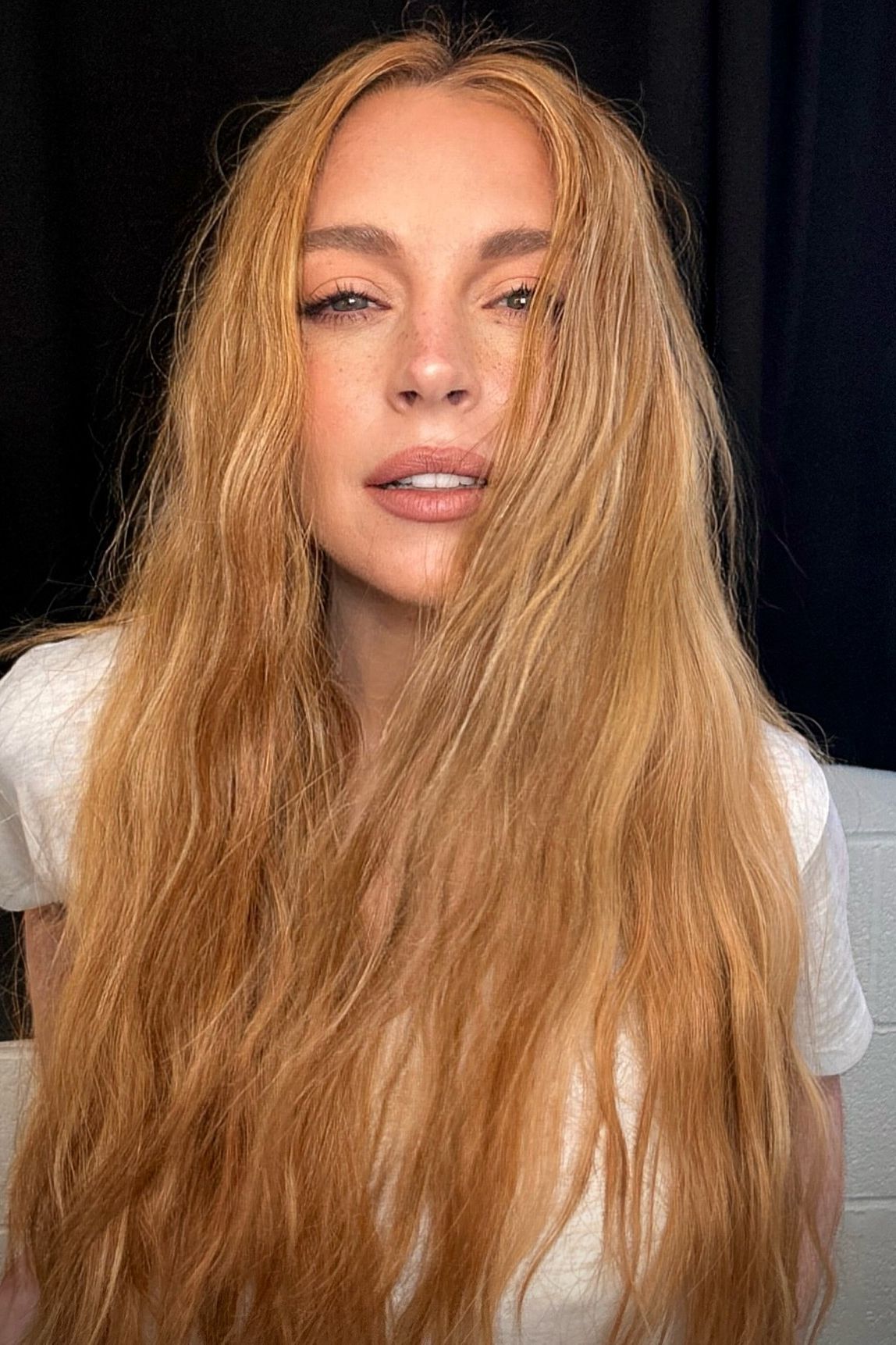 Strawberry Blonde With Wispy Bangs Strawberry Blonde With Wispy Bangs — Fall to Winter Hair Colors