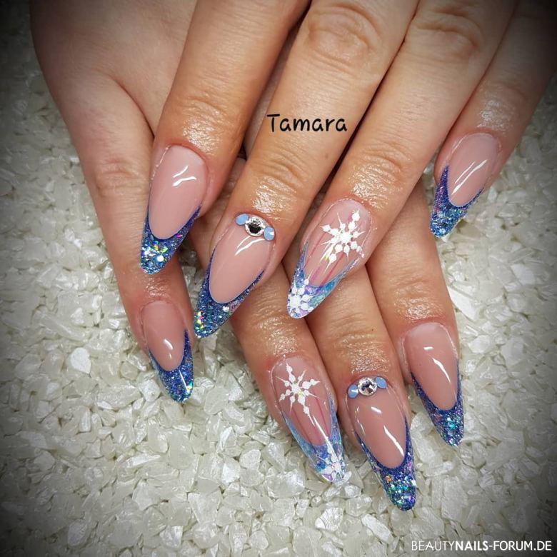 Long Stiletto Pink French with Blue Glitter Snowflakes Long Stiletto Pink French with Blue Glitter Snowflakes — Snowflake Nails
