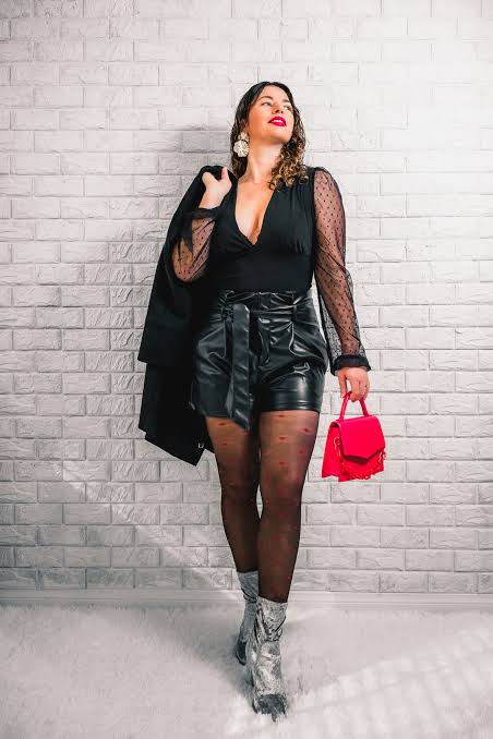 Leather Jacket Over Lace Dress with Suede Boots — Las Vegas Winter Outfits
