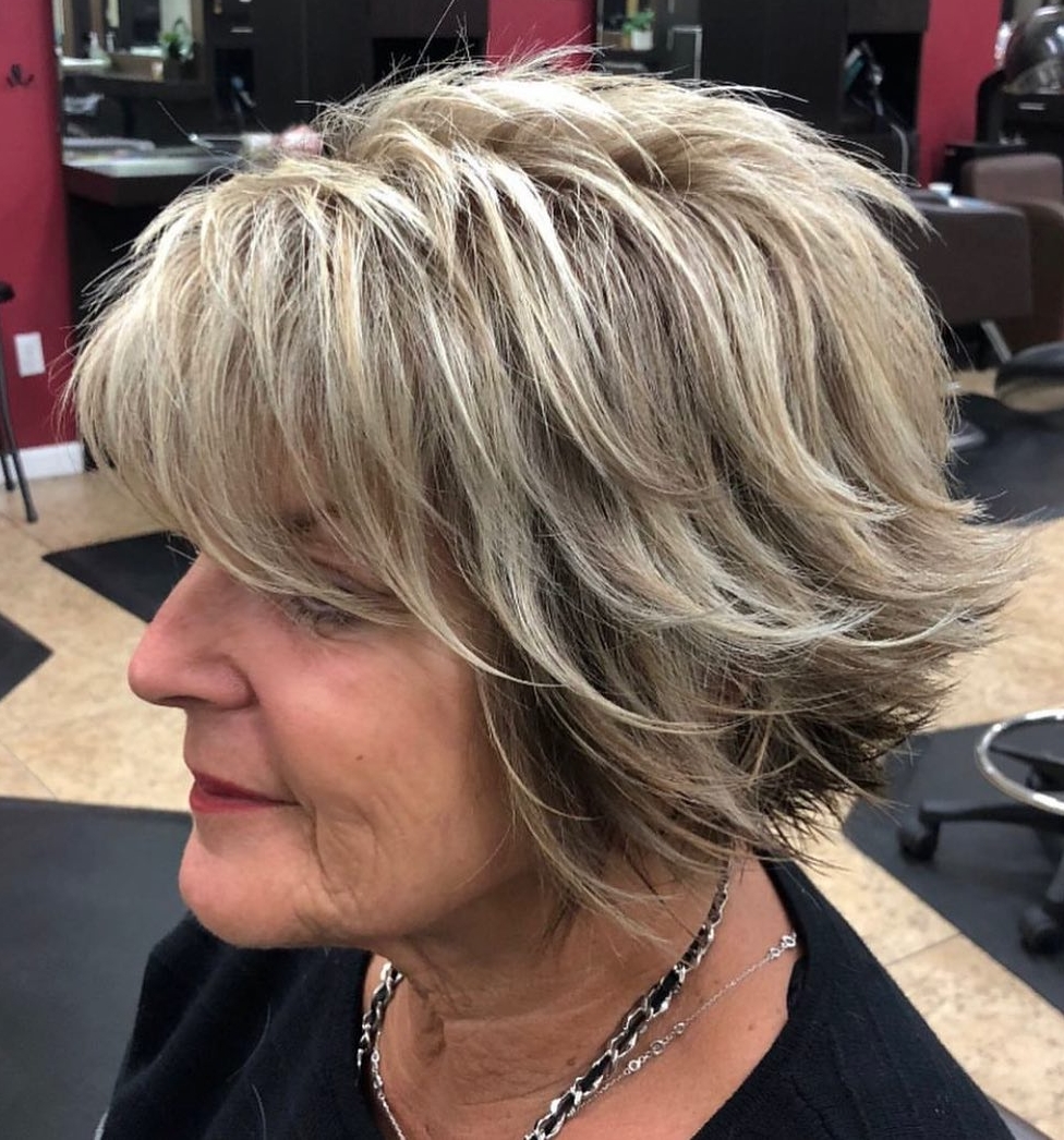 Layered Blonde Bob with Textured Highlights Layered Blonde Bob with Textured Highlights — Winter Hair Colors for Women Over 70
