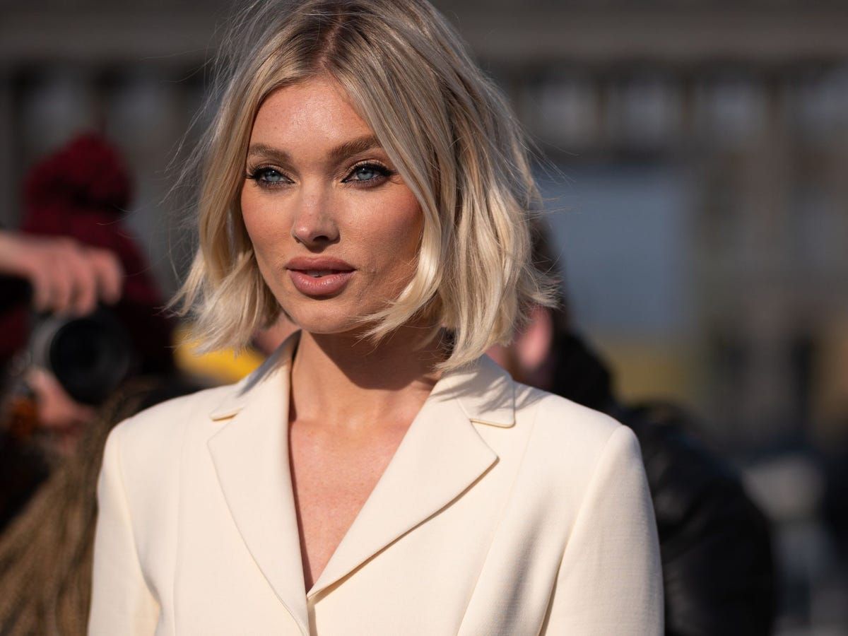 Ash Blonde Bob With Curtain Bangs — Winter Haircuts for Oval Faces