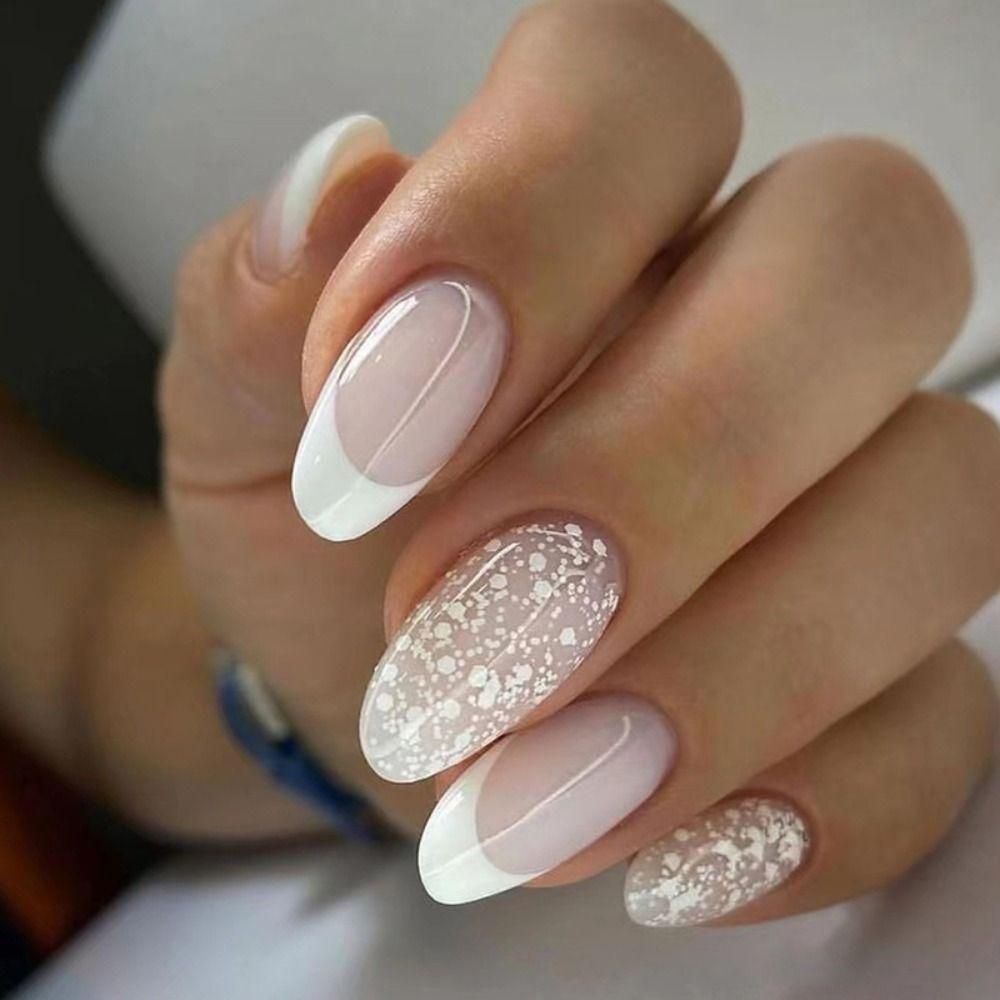 Nude French With White Speckle Accent Nude French With White Speckle Accent — Medium Winter Almond Nails