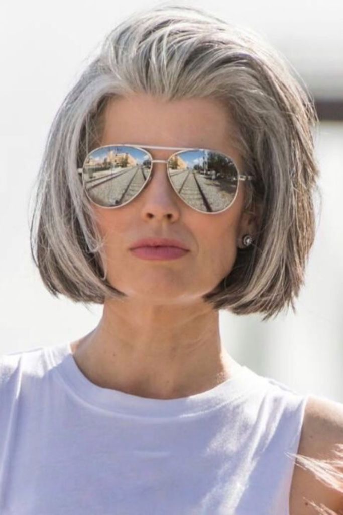 Chin-Length Bob With Natural Gray Transition Chin-Length Bob With Natural Gray Transition — Gray Blending Highlights
