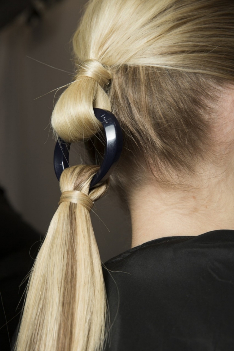 Light Blonde Ponytail With Ring Light Blonde Ponytail With Ring — Winter Party Hairstyles
