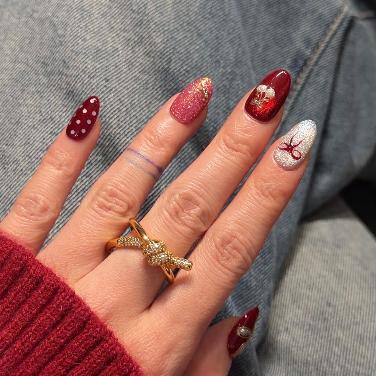 Vibrant Red Short Oval with Gold Glitter Accent Vibrant Red Short Oval with Gold Glitter Accent — Red and Gold Christmas Nails 2026