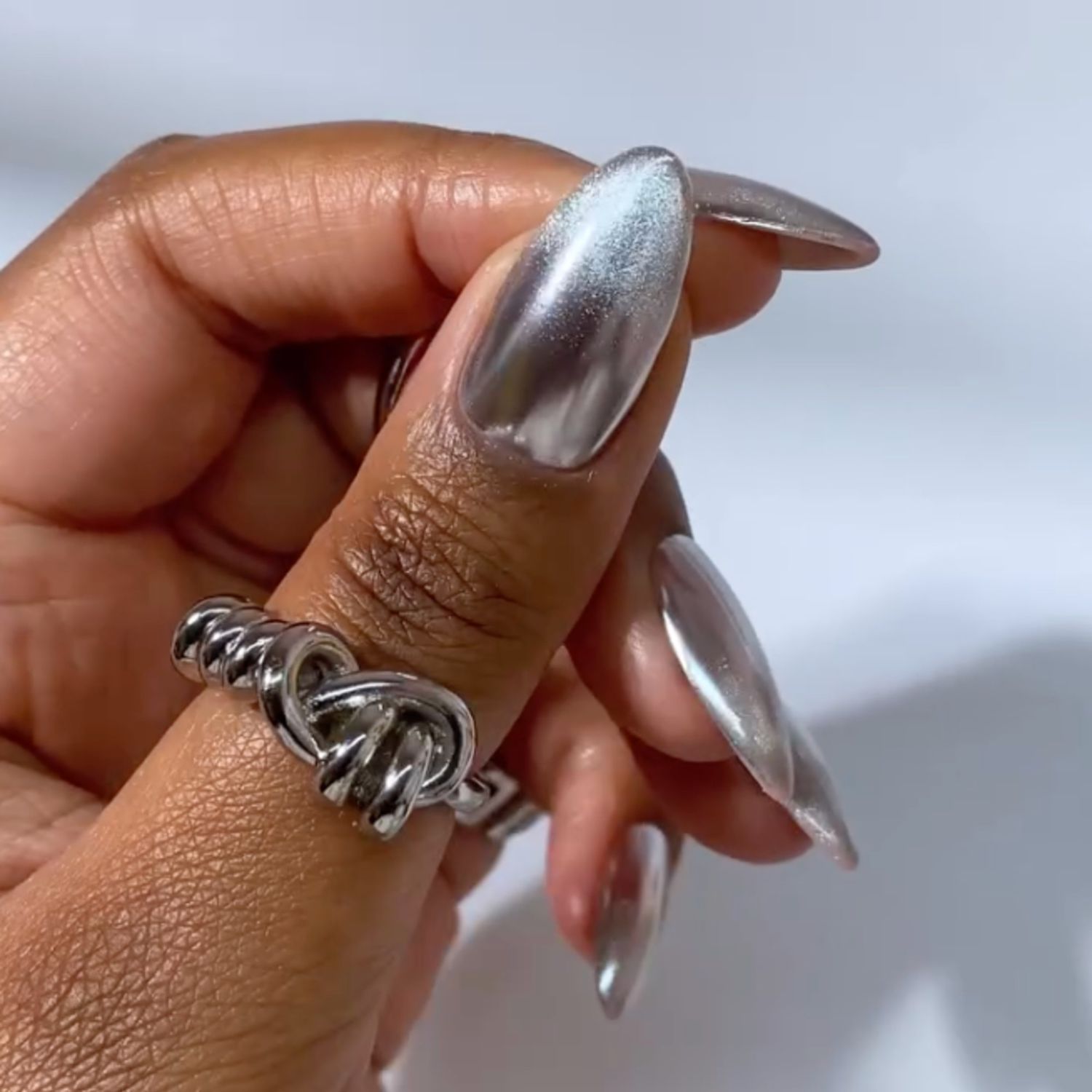 Medium Stiletto Metallic Silver Cat-Eye Nails Medium Stiletto Metallic Silver Cat-Eye Nails — New Years Eve Nails 2027