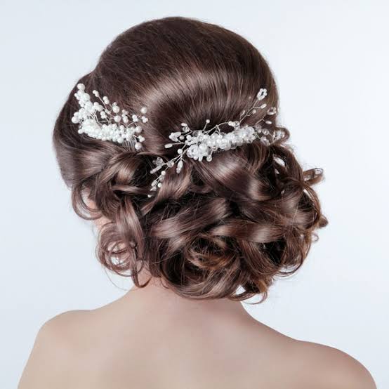 Elegant Dark Brown Updo — Winter Wedding Guest Hairstyles