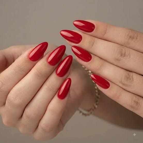 Classic Glossy Red Medium Almonds Classic Glossy Red Medium Almonds — Long Christmas Nails 2026