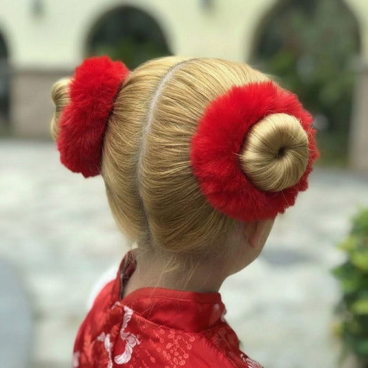 High Buns with Festive Red Accessories High Buns with Festive Red Accessories — Winter Hairstyles for Kids