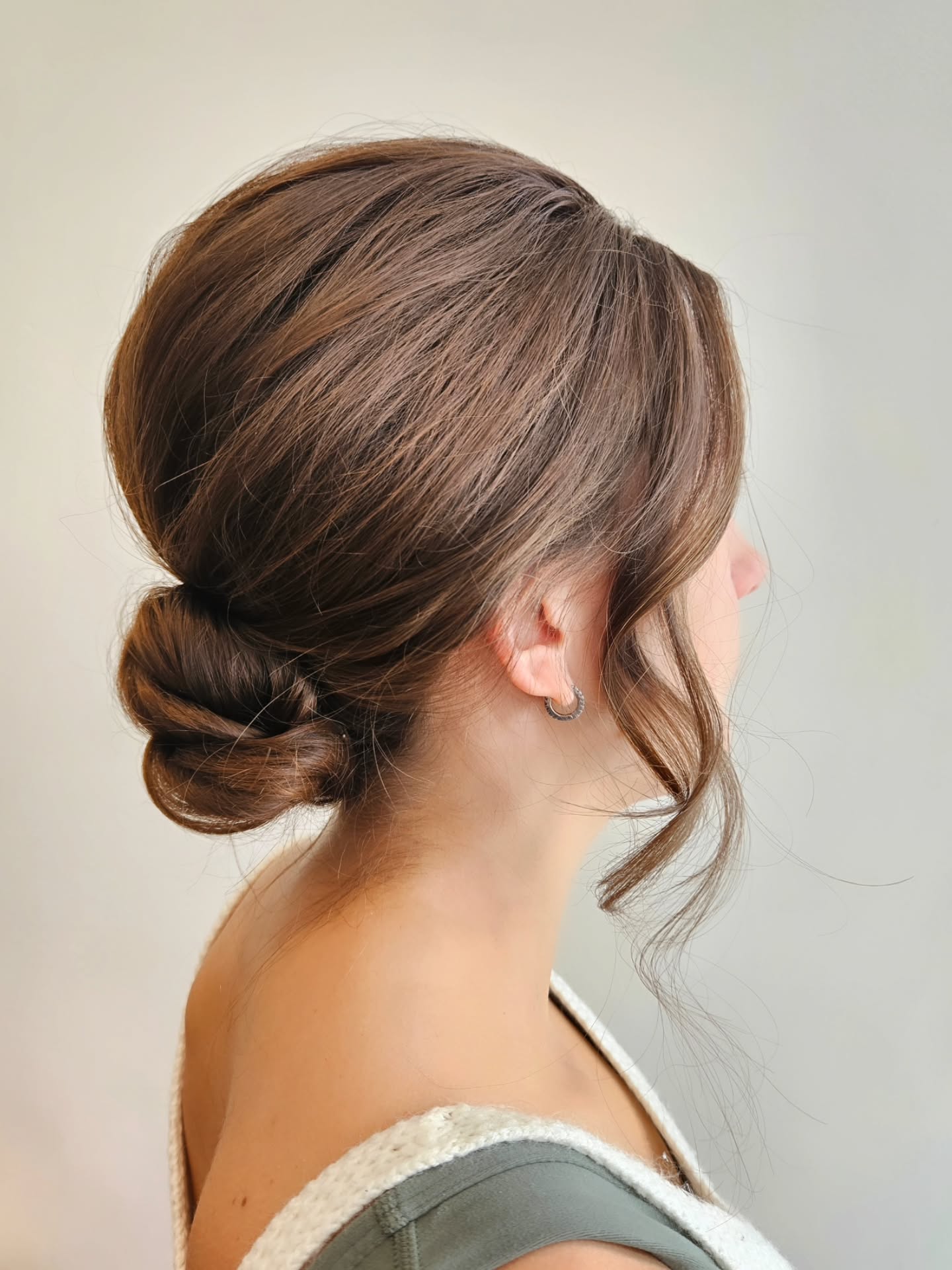 Sleek Low Twisted Bun — Winter Hairstyles for Work