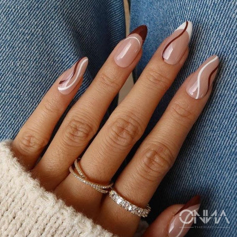Medium Almond Nude Swirl Lines and Tips Medium Almond Nude Swirl Lines and Tips — Fall to Winter Nails