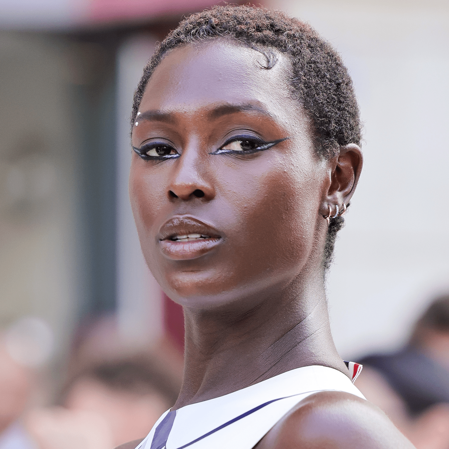 Textured Coily Pixie Styled Forward Textured Coily Pixie Styled Forward — Winter Haircuts for Black Women