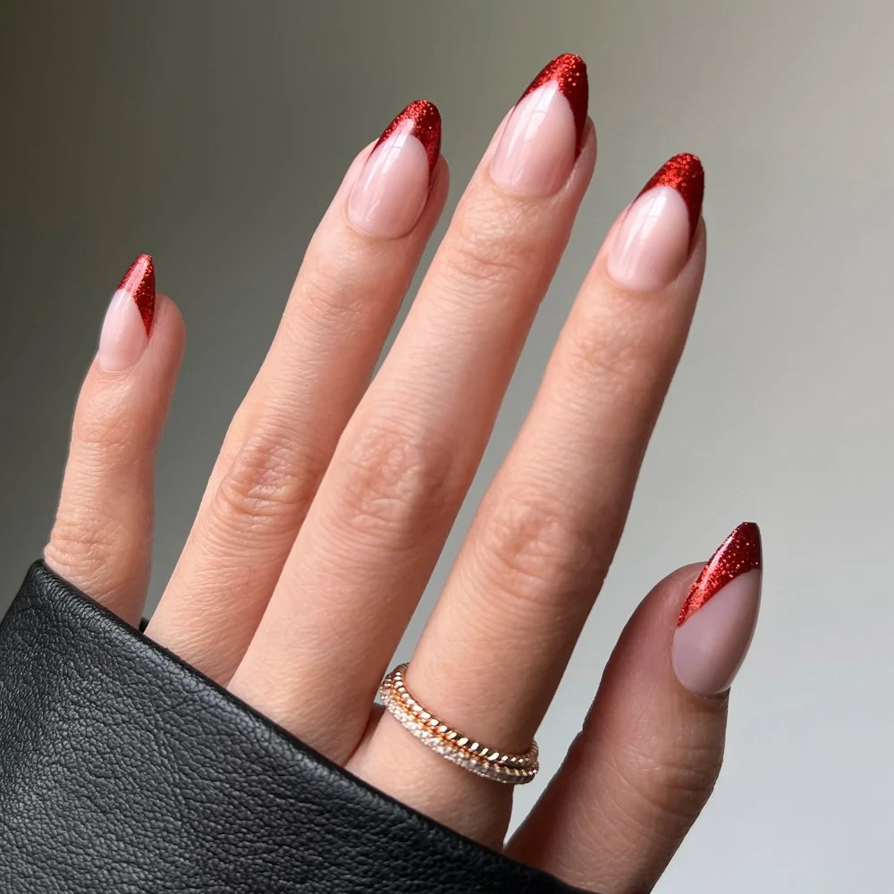 One Hand Sheer Pink Glitter Red French Tips One Hand Sheer Pink Glitter Red French Tips — Cherry Red Christmas Nails 2026