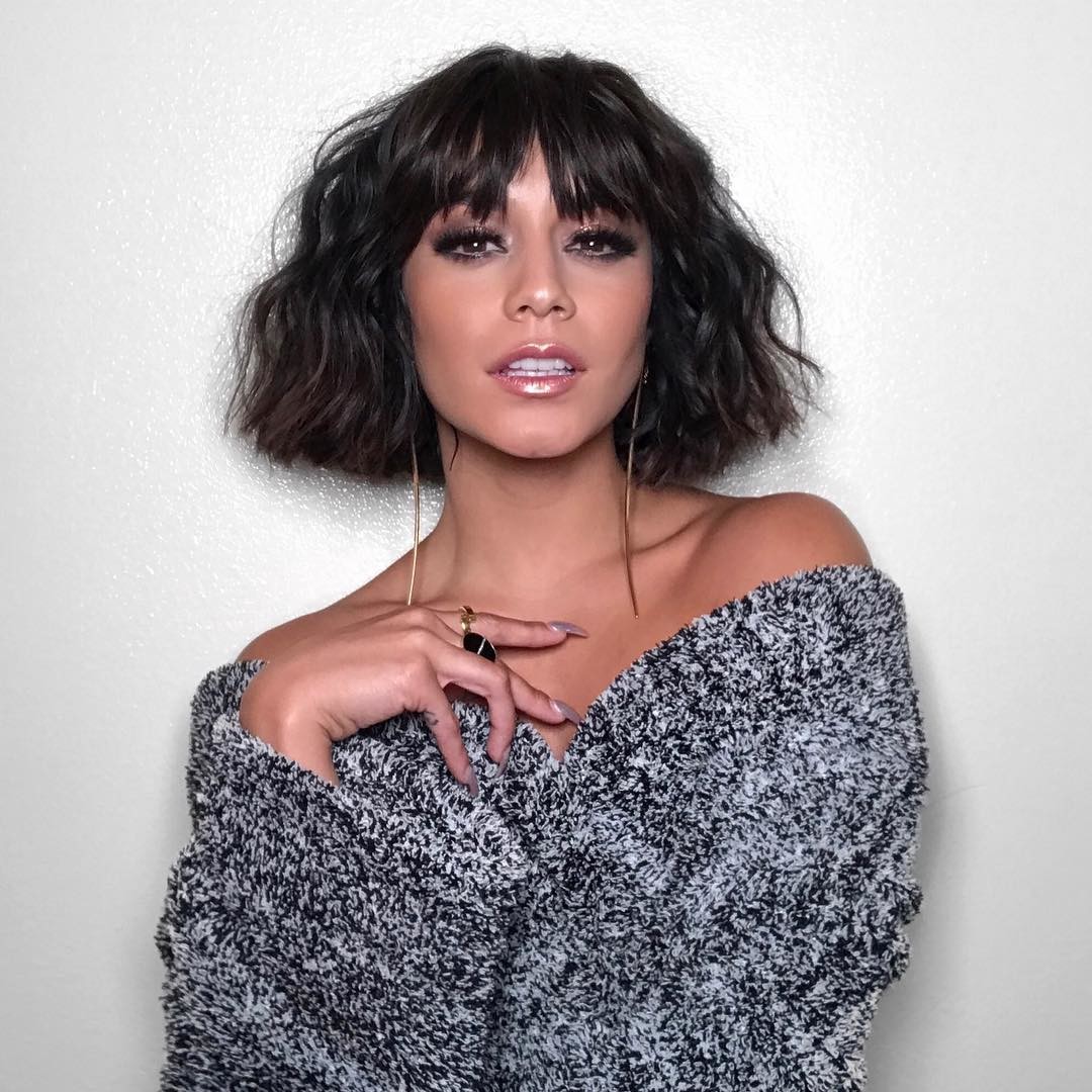 Dark Brown Wavy Chin Bob With Blunt Bangs — The Lighting Is Soft And Even Dark Brown Wavy Chin Bob With Blunt Bangs — The Lighting Is Soft And Even — Winter Haircuts with Bangs