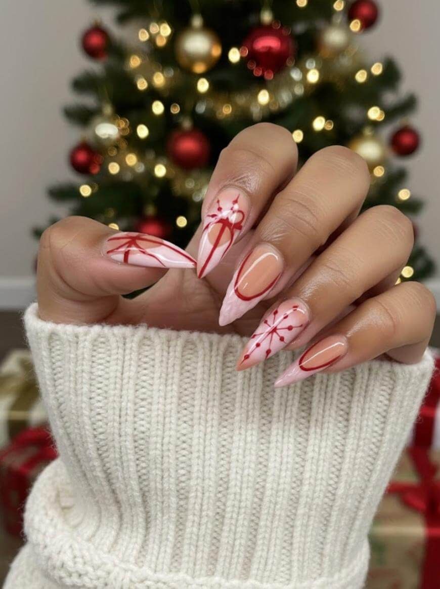 Nude & Pink Stilettos with Red Ribbon Art Nude & Pink Stilettos with Red Ribbon Art — Long Christmas Nails 2026