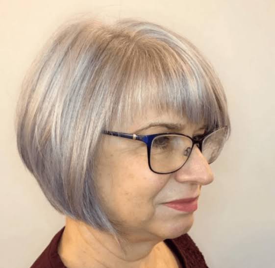 Chin Ash Blonde Bob with Silver Streaks Chin Ash Blonde Bob with Silver Streaks — Winter Hair Colors for Women Over 70