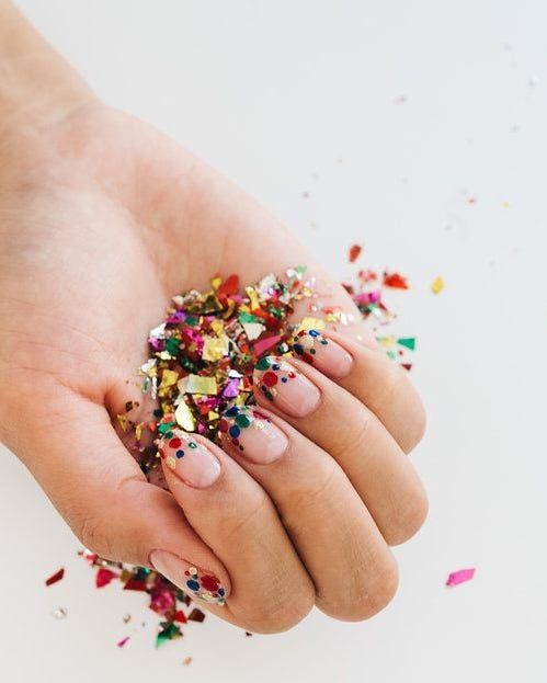 Confetti Glitter Scattered On Nail Tips Visual Idea — Simple New Years Nails 2027