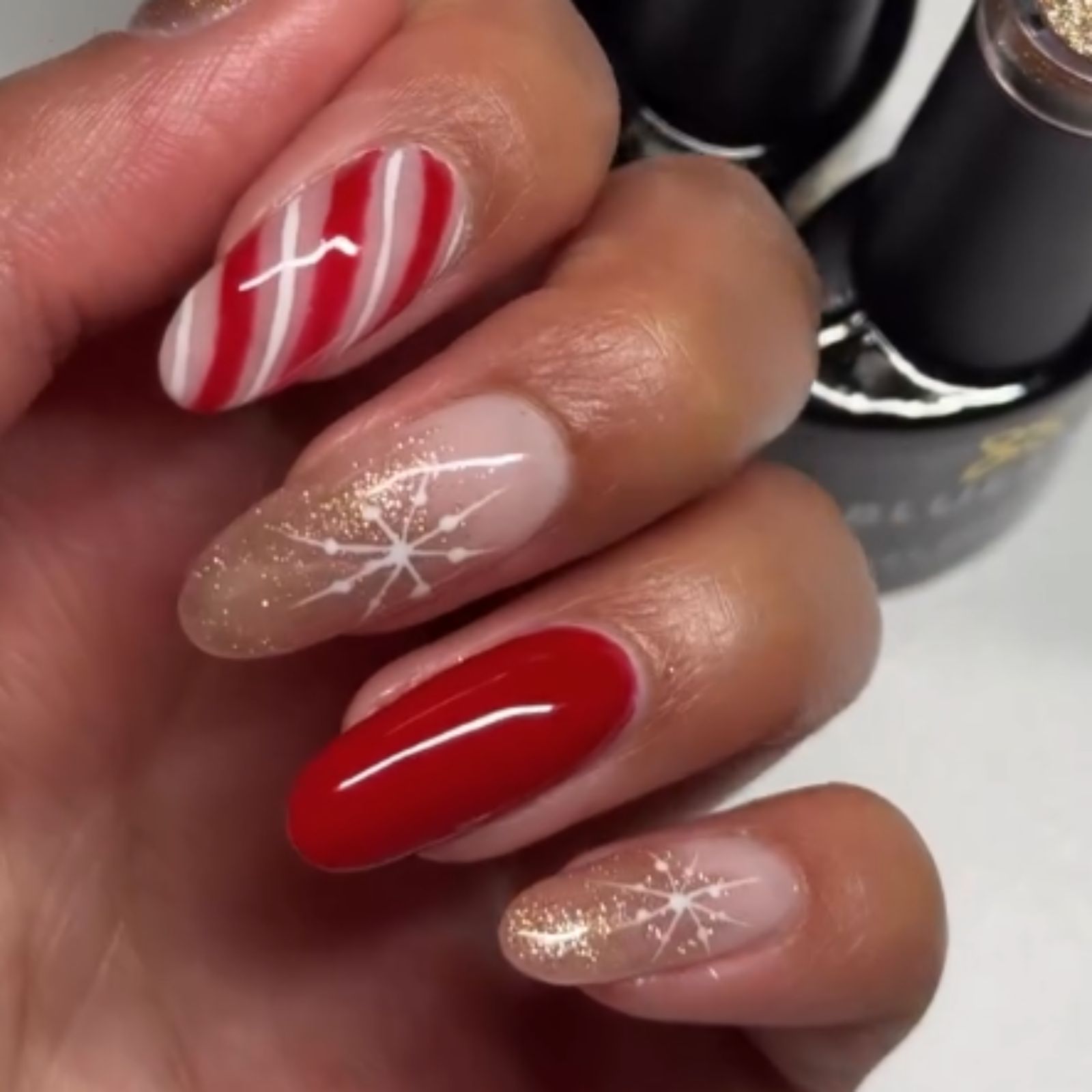 Long Almond Candy Cane and Snowflake Nails Long Almond Candy Cane and Snowflake Nails — Christmas Nail Designs 2026