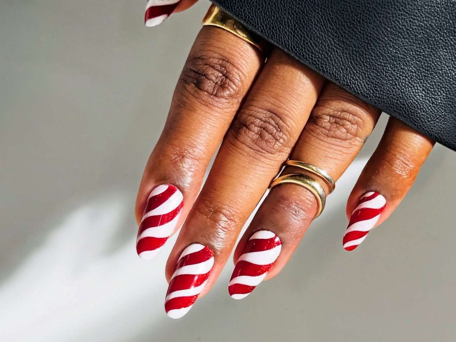 Bold Candy Cane Stripe Stilettos Bold Candy Cane Stripe Stilettos — Christmas Nails 2026