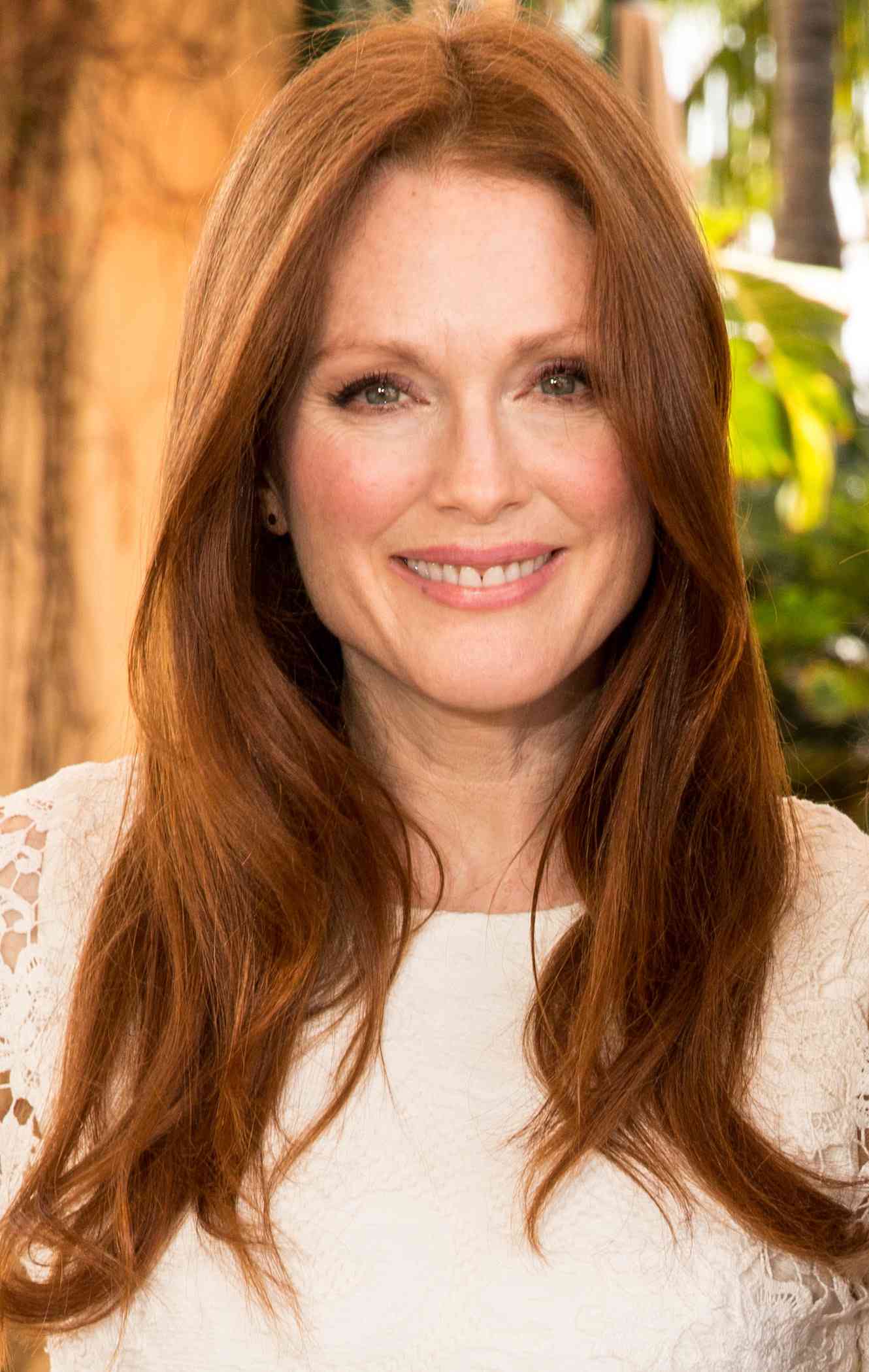 Long Wavy Red Hair With Subtle Layers Long Wavy Red Hair With Subtle Layers — Winter Haircuts for Women Over 50