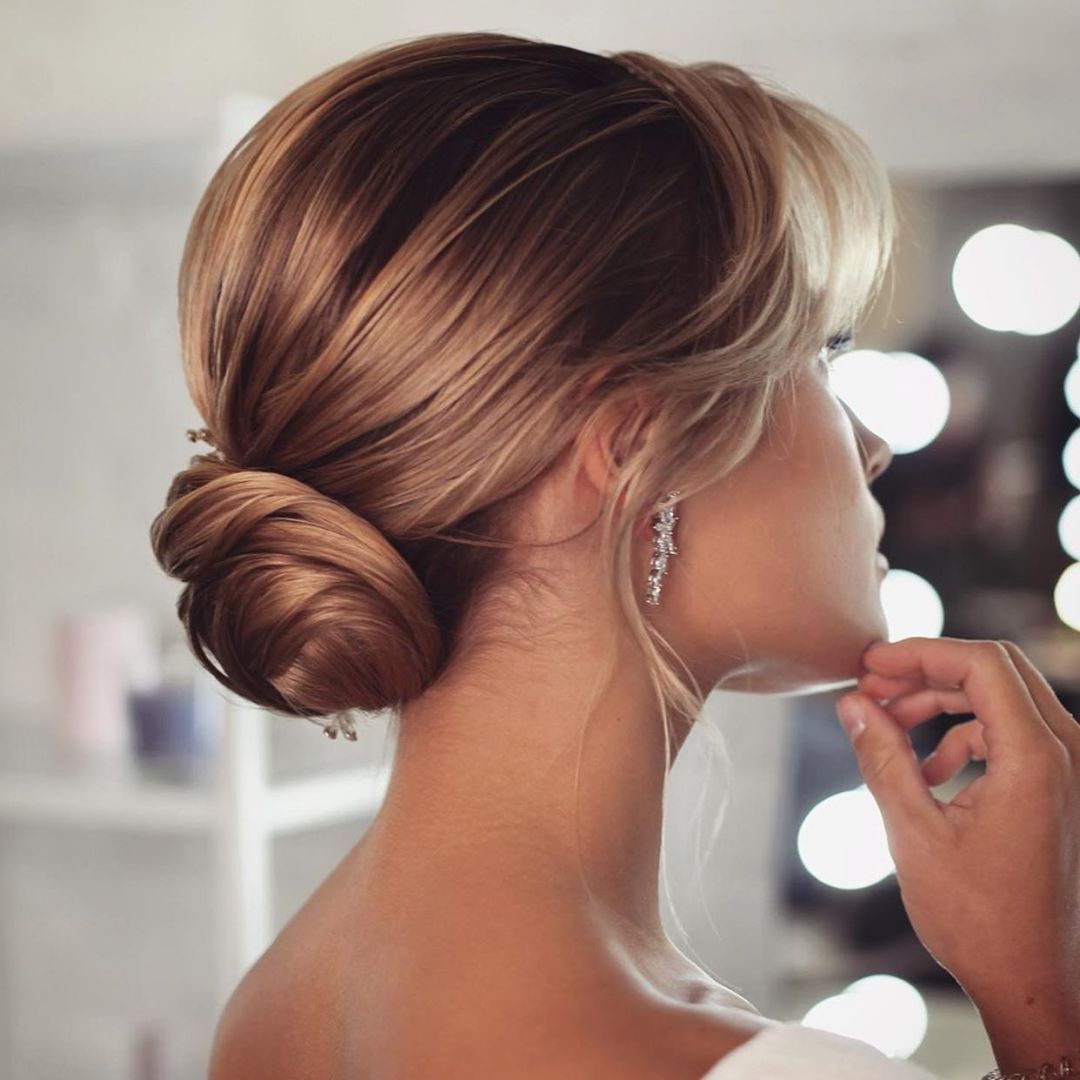Sleek Blonde Low Bun Sleek Blonde Low Bun — Winter Formal Hairstyles